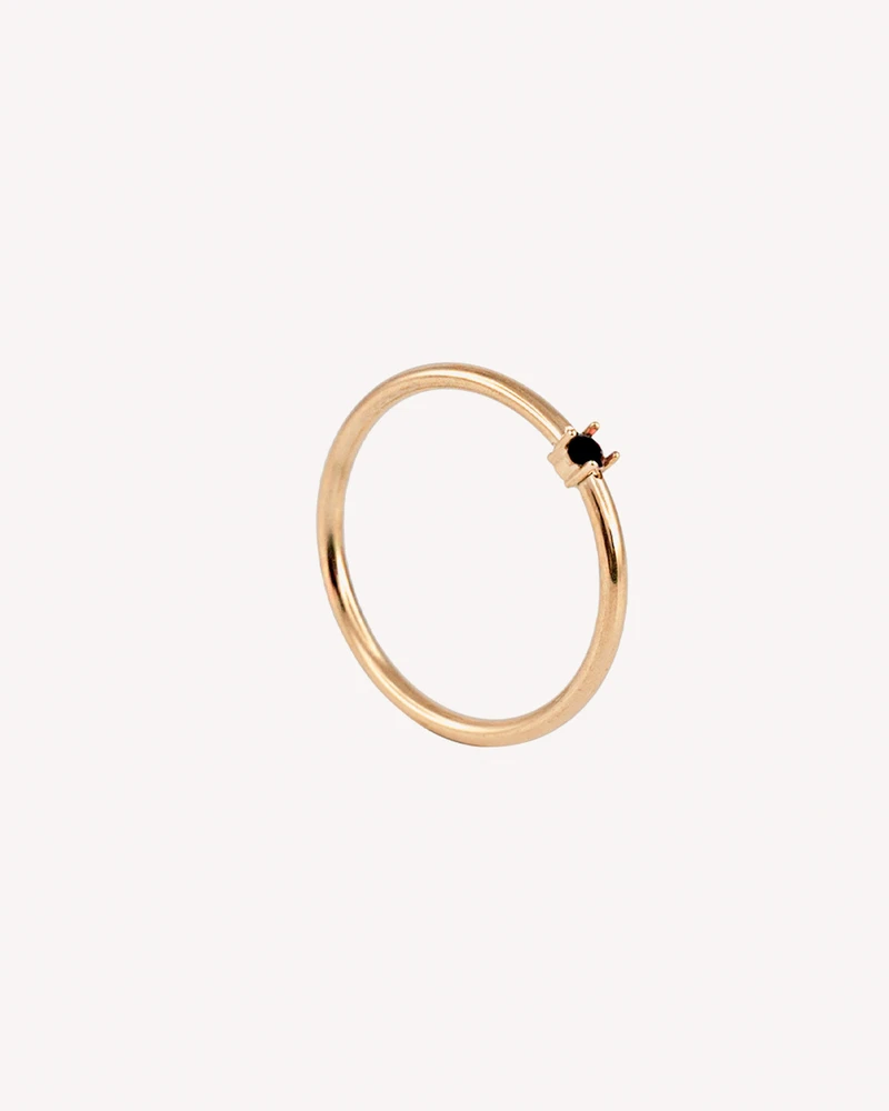 ANILLO JIRAF DORADO PIEDRA NEGRA